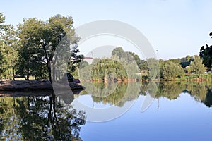 Artificial island with animals in the center of the pond in the Park. Pyatigorsk, Russia