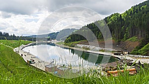 Artificial lake of youth in resort Bukovel, Carpathians, Ukraine. Travel concept