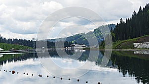 Artificial lake of youth in resort Bukovel, Carpathians, Ukraine. Travel concept