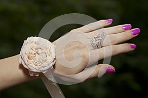 Artificial pink wedding buttonhole