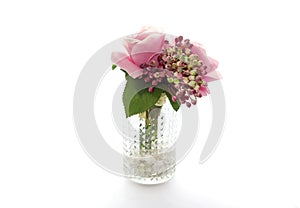 Artificial plastic flowers isolated on white background