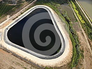 Artificial pond of a triangular oval shape