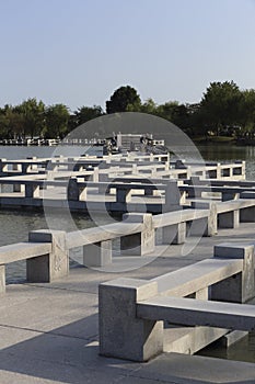 Artificial road on the lake in the park