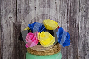 Artificial roses in a decorative vase