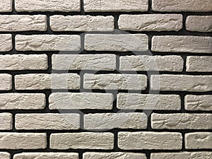 Artificial stone. Decorative wall of artificial torn stone.