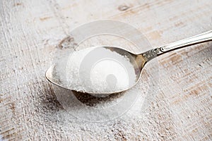 Artificial Sweeteners and Sugar Substitutes in metal spoon. Natural and synthetic sugarfree food additive: sorbitol, fructose, h