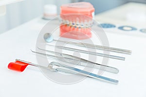 Artificial teeth model with dental equipment