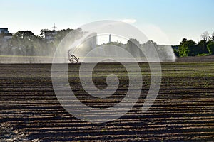 Artificial watering of a field due to dryness
