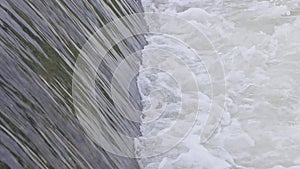 Artificial weir on a mountain river