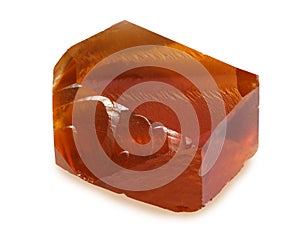 Artificially grown quartz crystal with iron addition simulating a citrine stone, isolated on white background