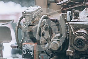 Artillery weapon. Old military cannon, closeup. Military background with elements of artillery weapons in camouflage green.