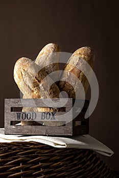 Artisan baguette bread, baking goods in rustic style