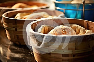 artisan bread dough rising in proofing baskets