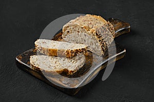 Artisan bread with sunflower seeds cut on slices