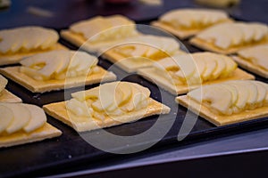 Artisan cakes of apple pie on a tray to be baked photo