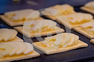Artisan cakes of apple pie on a tray to be baked photo