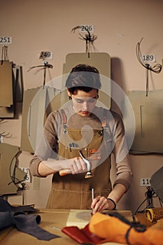 Crafting Leather Goods in Artisan Workshop