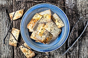 Artisan homemade crackers rustic setting.