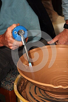 Artisan at potter's wheel