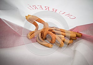 Artisan ring churros in bag photo