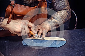 Artisan working as artisan at his workshelf