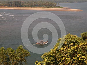 Artisanal fisheries fleet returning to port after a dayâ€™s fishing, in Goa, India