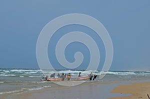 An artisanal fishing boat pirogue in Kayar/Cayar beach, north of Dakar