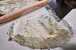 Artisanal Pasta Prep with Egg and Flour, Dough Scraper Close-Up