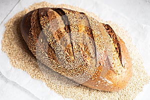 Artisanal sourdough bread with sesame seeds. Close up