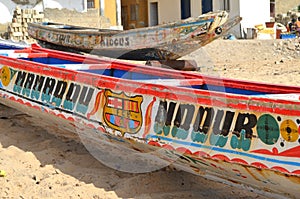 Artisanal wooden fishing boats pirogues in the Petite CÃ´te of Senegal, Western Africa
