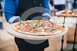 artisanal woodfired pizzas crafted at a food festival