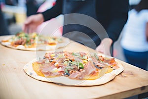 artisanal woodfired pizzas crafted at a food festival