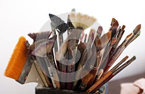 Artist brushes close up