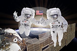 Artist creative edit composite depicting teamwork on ISS