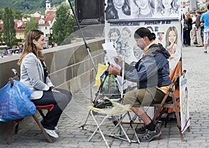 Artist drawing a portrait, raw