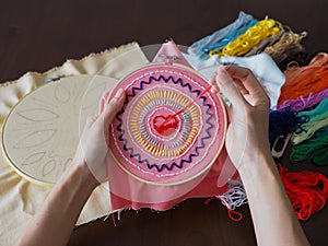 Artist home living space woman leisure hobby hand craft embroidery mandala spiritual mental health healing mind pattern handmade