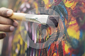Artist painting colorful on canvas artwork take for skill well