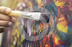 Artist painting colorful on canvas artwork take for skill well