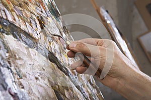 Artist Painting With Palette Knife