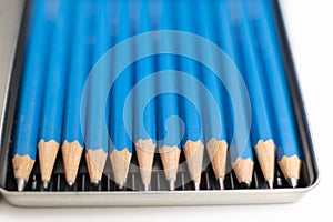 Artist pencils box different hardness - shallow focus photo