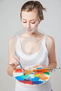 Artist woman with paint palette. Isolated.