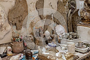 Artist work table with artworks and tools