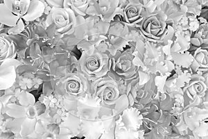 Artistic Background of Plastic Flowers in black and white.