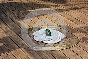 Artistic coiled ship rope on the deck of a sailing ship