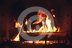 Artistic fire, fireplace with burning log