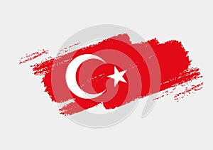 Artistic grunge brush flag of Turkey isolated on white background. Elegant texture of national country flag