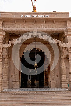 artistic hindu temple entrance at evening from unique perspective