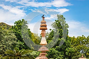 artistic jain red stone holy pillar at morning from unique angle