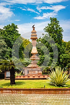 artistic jain red stone holy pillar at morning from unique angle