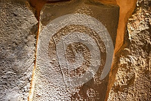 Artistic manifestation engraved in the stone in the megalithic monument of El dolmen de Soto